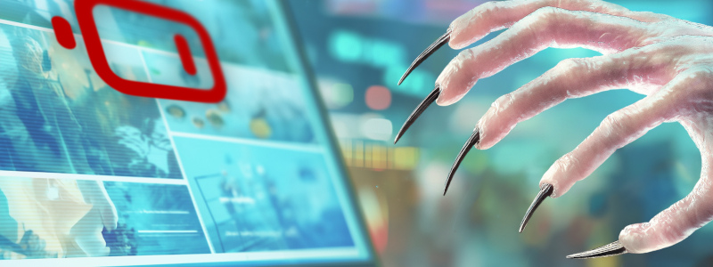 A vampiric hand with long sharp claws is reaching towards a laptop screen with a low battery warning on it.