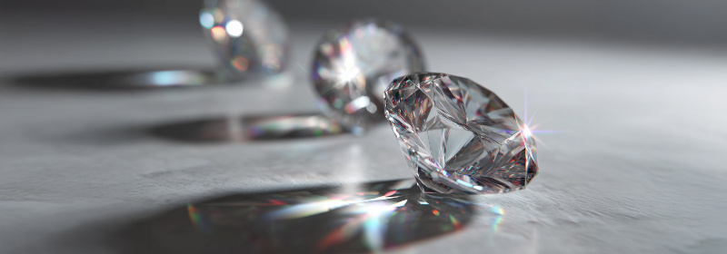 Diamonds glittering on a grey tabletop